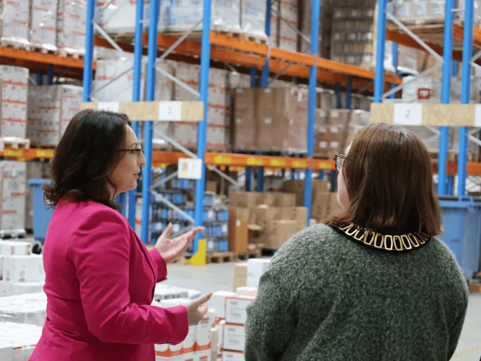 Logistics Manager, Agnes Robinson and Councillor Debbie Bates discuss the opening of Soudal UK's new National Distribution Centre