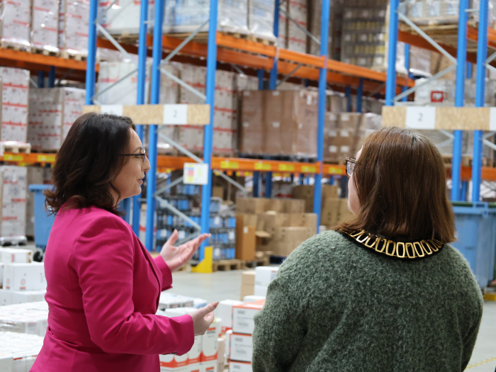 Logistics Manager, Agnes Robinson discuss the opening of Soudal UK's new National Distribution Centre with Councillor Debbie Bates